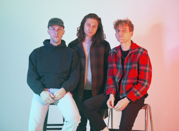 COIN stops by HollywoodLife.com to talk about their new single "Growing Pains" and 2018 tour.