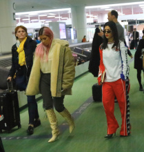 Kim Kardashian is all smiles as she poses with fans upon landing in Tokyo with her sisters for their first family trip overseas together in 2018. Kim was very happy to take some photos with her loyal fans as she flashed a peace sign and was spotted in customs with Kourtney and Khloe as they had their entourage and luggage with them. The girls made their way through the airport as a group and headed out of the airport for their first night in the city.