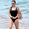 Lea Michele's Simple Black Swimsuit Has a Hell of a Twist From Behind