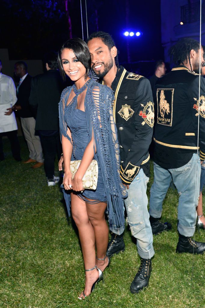 BEVERLY HILLS, CA - JULY 20: Nazanin Mandi (L) and Miguel at BALMAIN celebrates first Los Angeles boutique opening and Beats by Dre collaboration on July 20, 2017 in Beverly Hills, California.