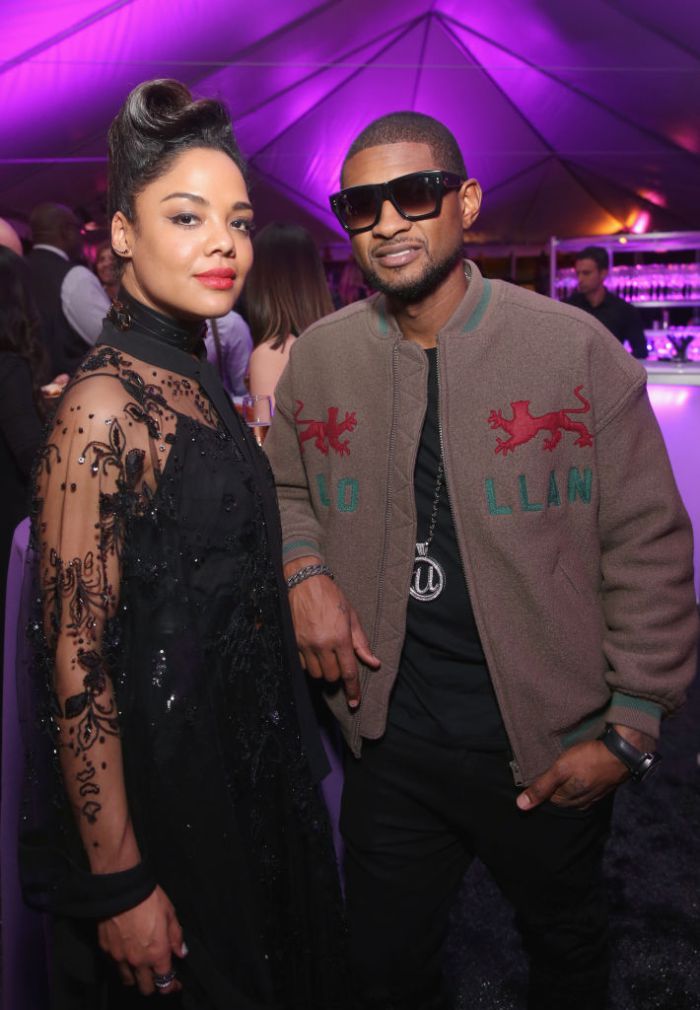 HOLLYWOOD, CA - JANUARY 29:  Actor Tessa Thompson and singer Usher at the Los Angeles World Premiere of Marvel Studios' BLACK PANTHER at Dolby Theatre on January 29, 2018 in Hollywood, California.  