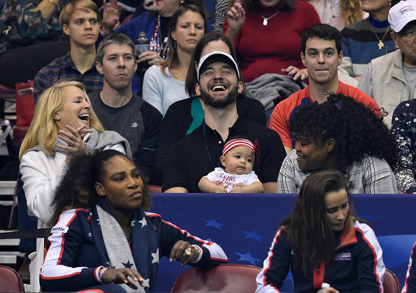 ASHEVILLE, NC - FEBRUARY 10: Serena Williams of Team USA, bottom left, along with her husband Alexis Ohanian and their daughter Alexis Olympia, center, watch the action during the first round of the 2018 Fed Cup at US Cellular Center on February 10, 2018 in Asheville, North Carolina