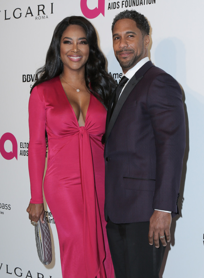 Celebrity arrival at the 26th annual Elton John AIDS Foundation's Academy Awards Viewing Party at The City of West Hollywood Park on March 4, 2018 in West Hollywood, California. Kenya Moore Marc Daly