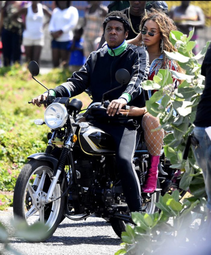 Beyonce Jay Z The superstar couple, who recently announced a joint tour, appear to be shooting a video for a collaboration, in one of the most famous poor neighbourhoods in the world. The pair can be seen looking as cool as ever as they ride a motorcycle through Trench Town, a Kingston district famous as much for its poverty as for being the breeding ground for Reggae stars such as Bob Marley. Beyonce at one point can be seen waving and blowing kisses.