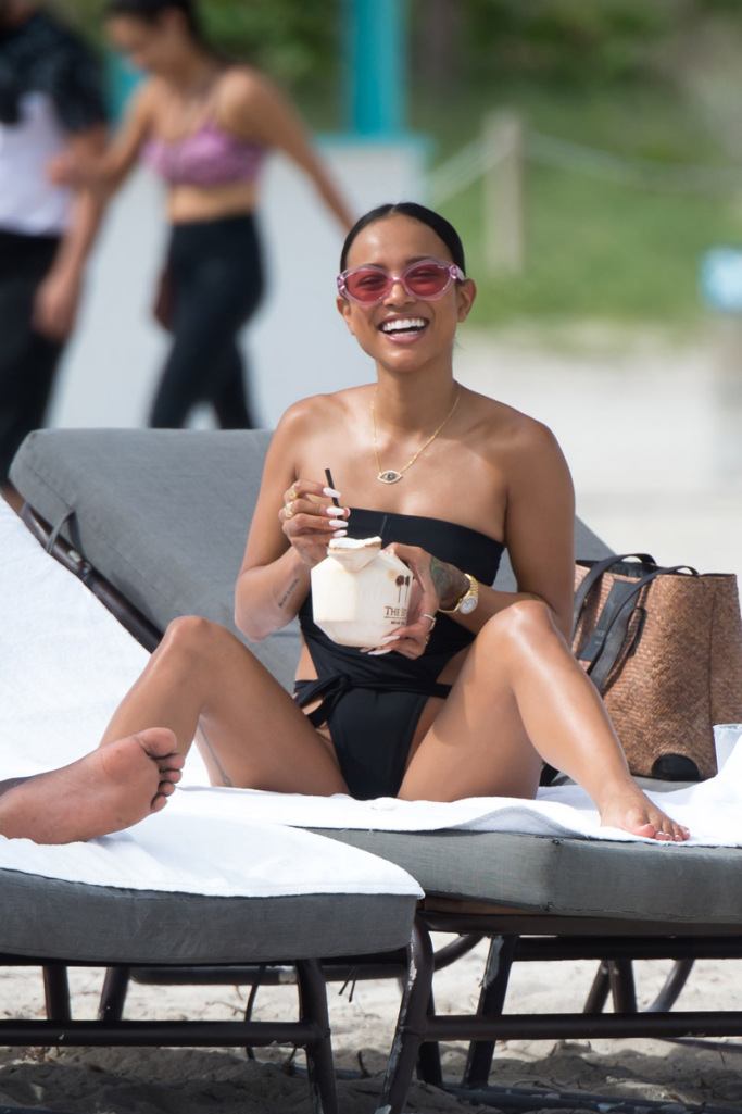 Karrueche Tran black bikini beach day with friends in Miami day after hosting the TV wedding from Gucci Mane and Keyshia Ka'Oir