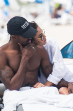 Newly Weds Shanina Shaik and and husband DJ Ruckus on Miami Beach just a few days after getting married in the Bahamas a with their adorable dog.