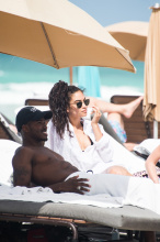 Newly Weds Shanina Shaik and and husband DJ Ruckus on Miami Beach just a few days after getting married in the Bahamas a with their adorable dog.