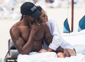 Newly Weds Shanina Shaik and and husband DJ Ruckus on Miami Beach just a few days after getting married in the Bahamas a with their adorable dog.