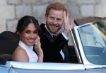 The newly married Duke and Duchess of Sussex, Meghan Markle and Prince Harry, leaving Windsor Castle after their wedding to attend an evening reception at Frogmore House, hosted by the Prince of Wales